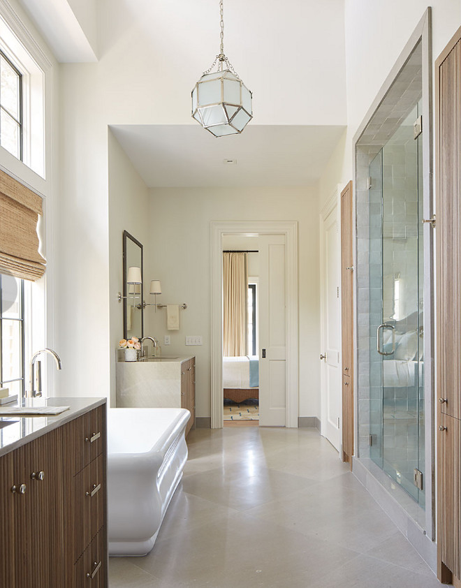 Neutral Bathroom Flooring Ideas. Notice the waterfall-edge vanities. The flooring is Limestone and the shower tile is Mosaic House R’Ceef. Neutral Bathroom Flooring Ideas. Neutral Bathroom Flooring Ideas. Neutral Bathroom Flooring Ideas #NeutralBathroomFlooring #NeutralBathroomFlooringIdeas Andrew Howard Interior Design