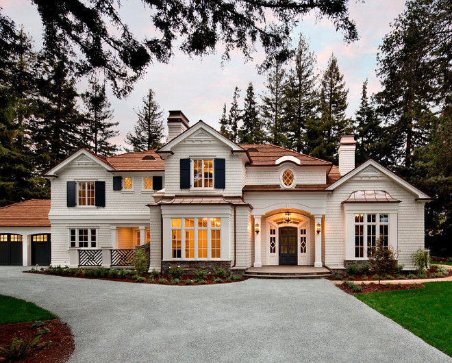 Shingle home with Eyebrow Dormer, arched front door, black shutters and copper roof and copper gutters #Shinglehome #Eyebrow #EyebrowDormer #archedfrontdoor #blackshutters #copperroof #coppergutters Spectrum Interior Design, Inc