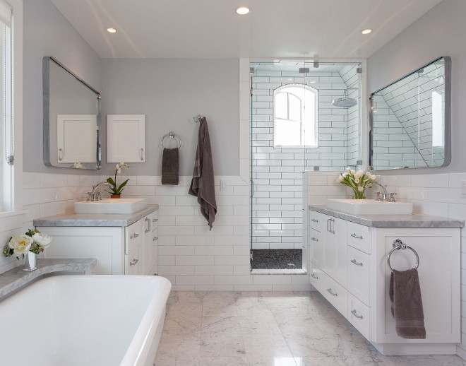 Bathroom half wall tile. This bathroom features half wall subway tile with white grout. The shower features the same tile with black grout to create some depth. Bathroom half wall subway tile. Bathroom half wall tile. Bathroom half wall subway tile and marble floor tile #Bathroom #halfwalltile #Bathroomhalfwallsubwaytile #halfwallsubwaytile Eric Aust Architect