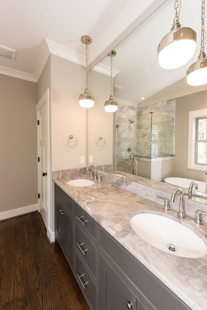 Bathroom with grey cabinet and neutral walls. The master bathroom features a beautiful white and grey countertop; "Silver Fantasy Marble" - honed. Master Bathroom with grey cabinet, grey marble countertop and neutral walls. Bathroom with grey cabinet and neutral wall ideas. Bathroom with grey cabinet and neutral walls #Bathroom #greycabinet #neutralwalls #greymarble #greymarblecountertop #SilverFantasy #SilverFantasyMarble Willow Homes