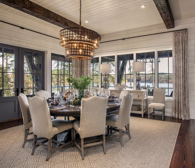 Breakfast Room with shiplap walls, Industrial lighting, reclaimed beams, reclaimed heart pine floors and grey metal French doors and windows. #BreakfastRoom #shiplap #Industriallighting #reclaimedbeams #reclaimedheartpinefloors #metalFrenchdoors #windows Wright Design