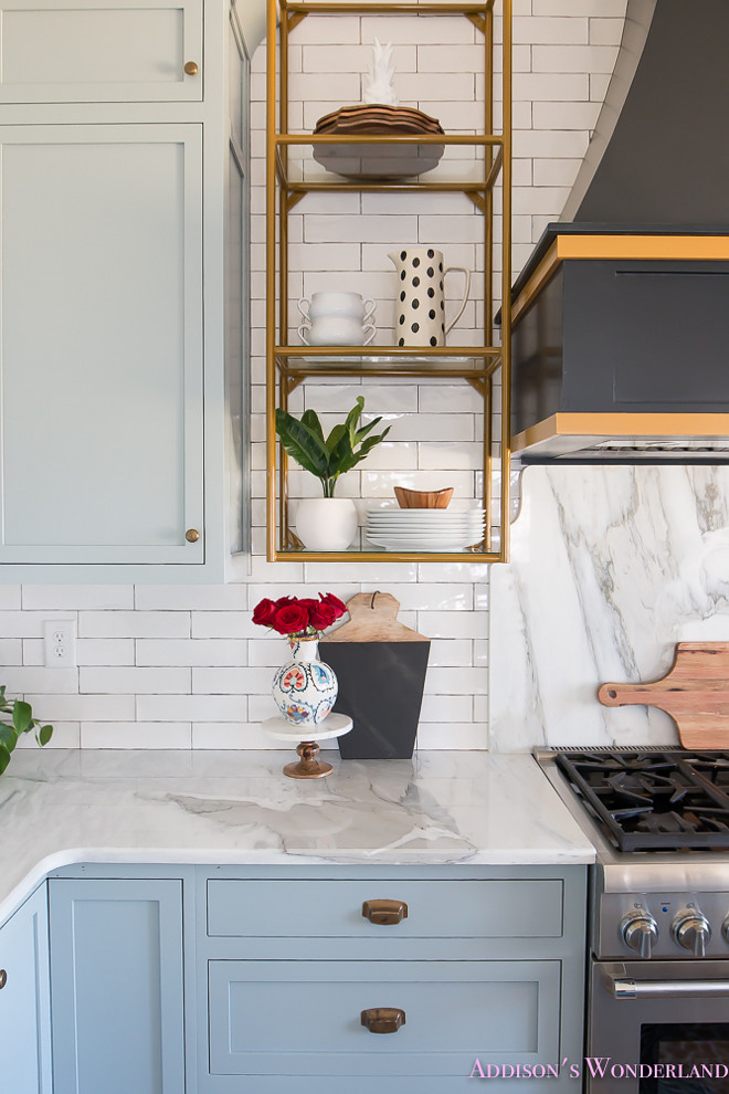 Crackle Subway Tile Backsplash. Backsplash is a white crackle subway tile with black grout, and marble slab behind the range. White Crackle Subway Tile Backsplash. Kitchen backsplash Crackle Subway Tile Backsplash #Kitchenbacksplash #CrackleSubwayTile #CrackleSubwayBacksplash #Backsplashtile Home Bunch's Beautiful Homes of Instagram @addisonswonderland