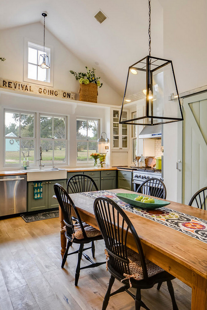 Farmhouse Kitchen. Farmhouse Kitchen Design. Beautiful farmhouse style kitchen with band sawn plank floors, vaulted ceilings and an antique sign. Farmhouse Kitchen. Farmhouse Kitchen Design. Farmhouse Kitchen. Farmhouse Kitchen Design #FarmhouseKitchen #FarmhouseKitchenDesign #FarmhouseKitchens #Farmhouse #KitchenDesign #Farmhouses #bandsawnplankfloor #vaultedceilings #antiquesign #farmhousesigns #vintagesigns Van Wicklen Design