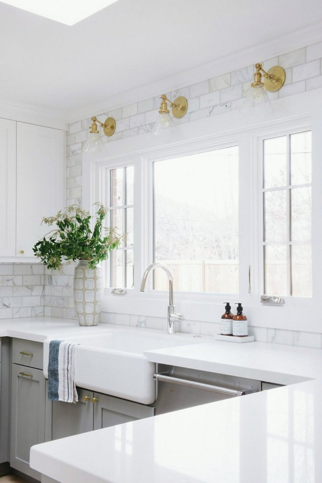 Kitchen Countertop and Backsplash. My favorite detail in this kitchen is the solid white quartz countertop paired with the calcutta marble backsplash that goes up to the ceiling. #backsplash #countertop #whitequartz #kitchen #backsplashtotheceiling Studio McGee