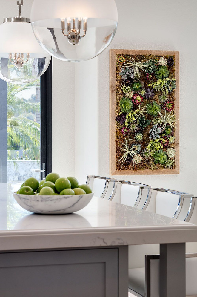 Kitchen Marble-looking Caesarstone Quartz Countertop. Pendants are Urban Electric - Globus Pendants with polished nickel and partially etched. Kitchen Marble-looking Caesarstone White Quartz Countertop. Kitchen Marble-looking Caesarstone Quartz Countertop. Kitchen Marble-looking Caesarstone Quartz Countertop #KitchenCountertop #MarblelookingCountertop #CaesarstoneCountertop #Quartz #Caesarstone Tracy Lynn Studio