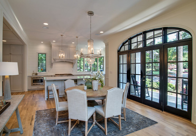 Kitchen with black framed patio doors. Kitchen with black framed patio door ideas. Kitchen with black framed patio doors #Kitchen #blackframeddoors #patiodoors #blackframedpatiodoor Tammy Coulter Design - Grandfather Homes