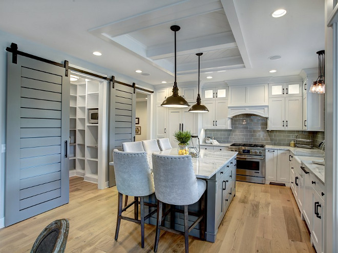 Modern Farmhouse Kitchen with Barn Door to Pantry. Modern Farmhouse Kitchen with Barn Door to Pantry. The sliding barn doors were custom, designed by CVI Design and made by a carpenter. Modern Farmhouse Kitchen with Barn Door to Pantry. Modern Farmhouse Kitchen with Barn Door to Pantry #ModernFarmhouseKitchen #BarnDoor #Pantry #FarmhouseKitchen #PantryBarnDoor #Kitchen #KitchenBarnDoor #kitchenPantry #PantryDoor CVI Design