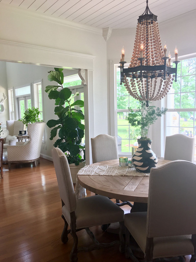 Neutral Farmhouse breakfast nook. Charming and welcoming Neutral Farmhouse breakfast nook. This beautiful, neutral paint color is Sherwin Williams SW 7008 Alabaster. Breakfast table is from Restoration Hardware, chairs are Overstock. The raw-wood beaded chandelier is from Paul Michael Company in Layette LA. Neutral Farmhouse breakfast nook. Neutral Farmhouse breakfast nook. Neutral Farmhouse breakfast nook #NeutralFarmhousebreakfastnook #Farmhousebreakfastnook #Neutralbreakfastnook #Farmhouse #breakfastnook #SherwinWilliamsSW7008Alabaster Beautiful Homes of Instagram @cindimc.ivoryhome