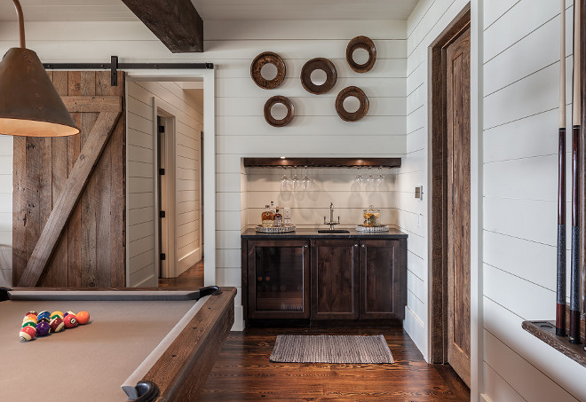 Shiplap Games Room. Games room with wet bar, shiplap walls, rustic barn door, heart pine floors. #Shiplap Games Room. Games room with wet bar, shiplap walls, rustic barn door, heart pine floors #Shiplap #GamesRoom #ShiplapGamesroom #wetbar #shiplapwalls #rusticbarndoor #barndoor #heartpinefloors Wright Design