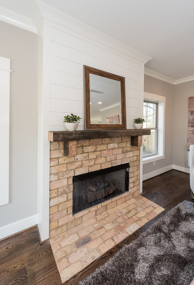 Shiplap and Brick Fireplace. Farmhouse Shiplap and Brick Fireplace. Reclaimed Brick Fireplace. Brick. Farmhouse interiors Shiplap and Brick. Shiplap is painted in Benjamin Moore White Dove. Brick is reclaimed old chicago brick #ShiplapandBrickFireplace #FarmhouseShiplap #BrickFireplace #Reclaimedbrick #reclaimedbrickfireplace #Farmhouseinteriors #Shiplap #Brick #shiplappaintcolor #BenjaminMooreWhiteDove #oldchicagobrick Willow Homes