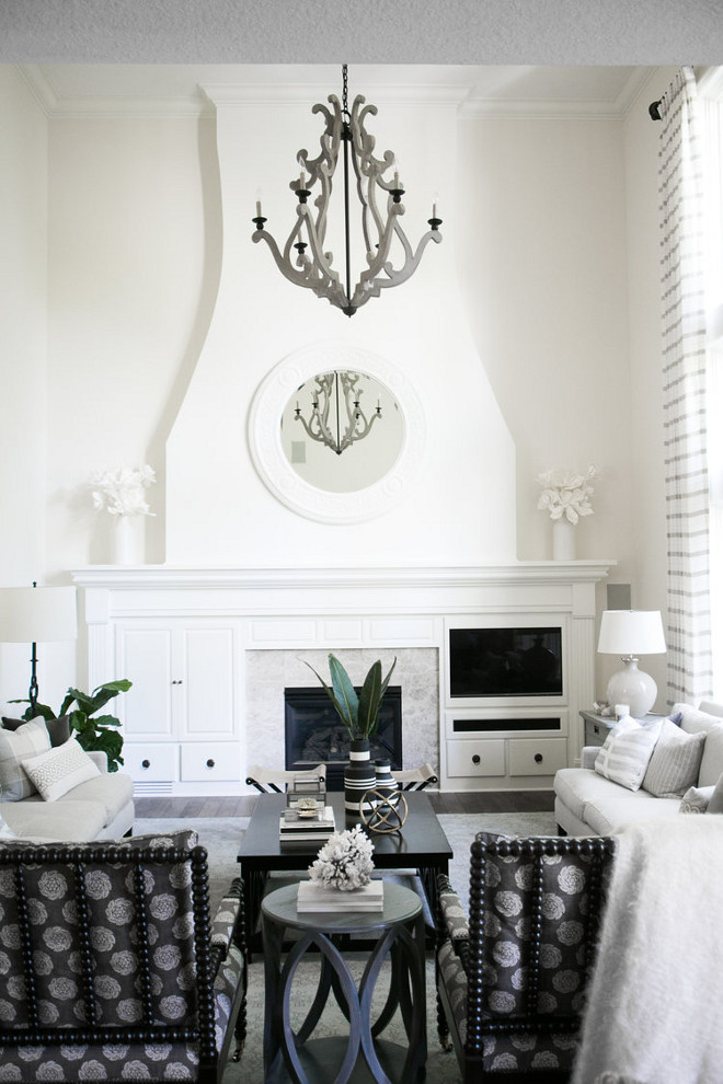 Fireplace Design. Flute , made of sheet rock to mimic the kitchen hood. Lighting is Currey & Co. - Durand. #FireplaceDesign Bria Hammel Interiors