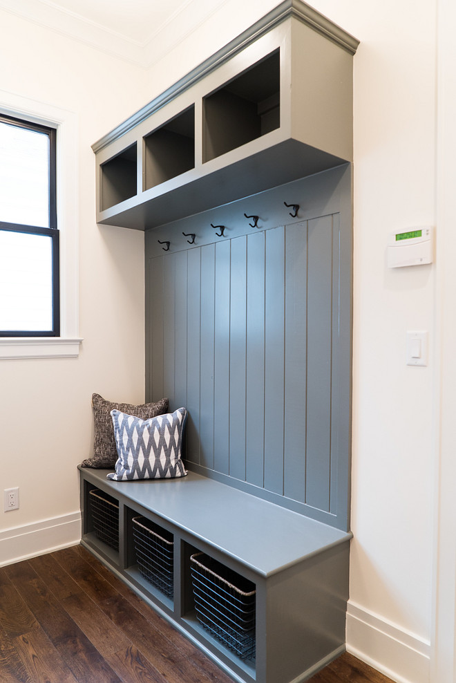 Grey Mudroom Cabinet Paint Color Benjamin Moore HC-­163 Duxbury Gray. The mudroom features practical grey cabinetry and hardwood flooring. Wall color is Benjamin Moore OC-57 White Heron and the built ins are HC-163 Duxbury Gray. Grey Mudroom Cabinet Paint Color. Grey Mudroom Cabinet Paint Color #GreyMudroomCabinetPaintColor #BenjaminMooreHC163DuxburyGray Ramage Company