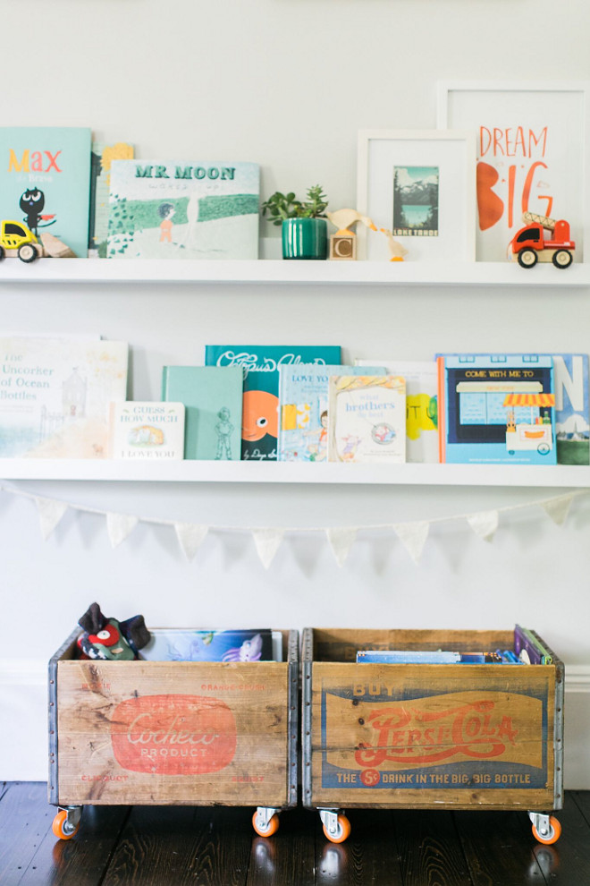 Kids Bookshelves. Kids bedroom Bookshelves. Kids playroom Bookshelves. We created a reading nook on one wall out of Potterybarn ledges and old crates we added wheels to. Kids Bookshelves. Kids bedroom Bookshelves. Kids playroom Bookshelves #KidsBookshelves #Kids #Bookshelves #KidsbedroomBookshelves #KidsplayroomBookshelves Home Bunch Beautiful Homes of Instagram @finding__lovely