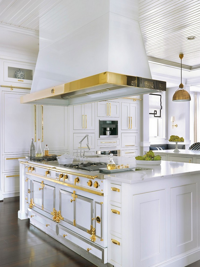 La Cornue range with custom hood. White La Cornue with brass. La Cornue Range. White Hamptons kitchen with brass hardware and white La Cornue range #LaCornuerange #customhood #WhiteLaCornue #brass #LaCornue #Range #WhiteHamptonskitchen #Hamptonskitchen #brasshardware #whiteLaCornue Mitchell Wall Architecture & Design