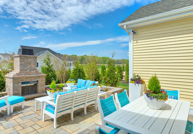 Patio Fireplace. Patio Fireplace Layout. Outdoor fireplace offers privacy to this patio. Patio Fireplace #PatioFireplace Echelon Custom Homes