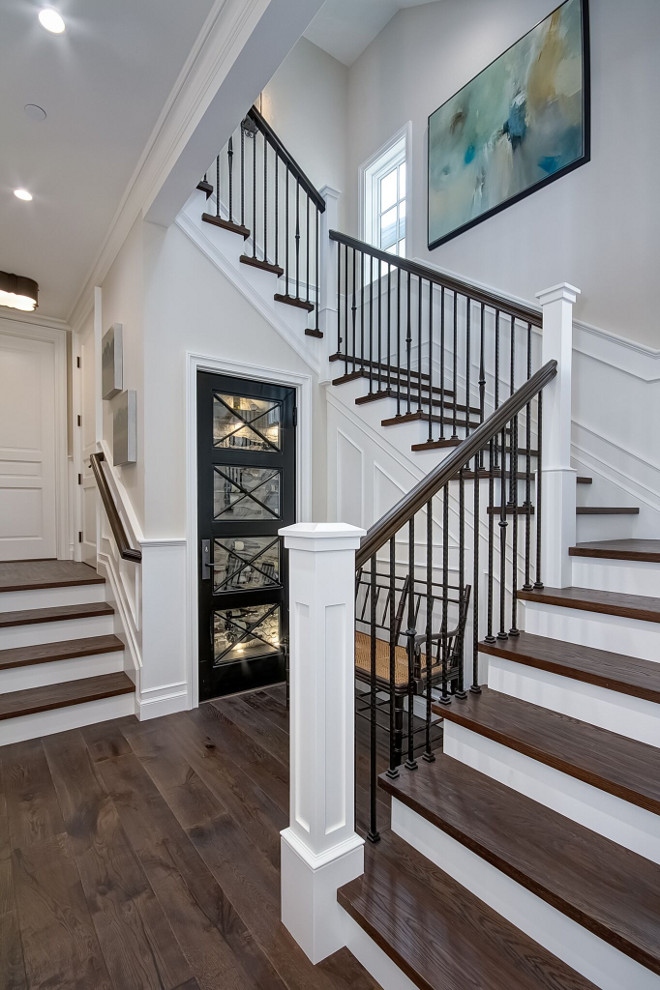 Staircase Design. Staircase wood treads and wrought iron spindles. Staircase Design. The staircase features White Oak wood treads and custom wrought iron spindles. Staircase wood treads and wrought iron spindles. Custom Staircase Design. Staircase wood treads and wrought iron spindles #Staircase #StaircaseDesign #Staircasewoodtreads #Staircasetreads #woodtreads #wroughtironspindles Brandon Architects, Inc.