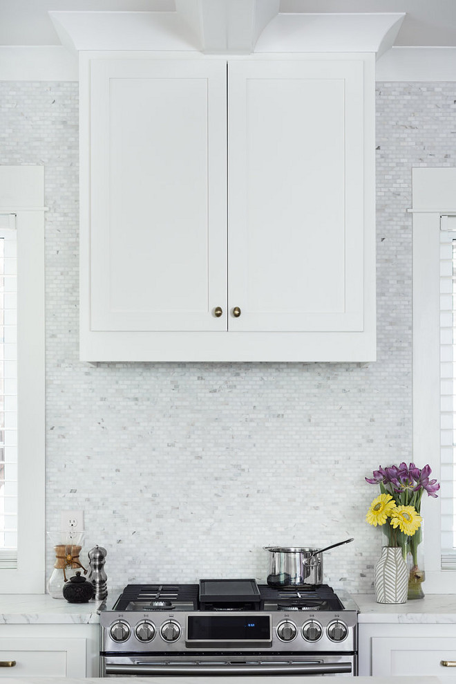 Upper Cabinet style hood with mini-tile backsplash. Kitchen with Upper Cabinet style hood with mini-tile backsplash. Upper Cabinet style hood with marble mini-tile backsplash #UpperCabinetstylehood #Cabinetstylehood #marbleminitilebacksplash #minitilebacksplash #cabinethood Willow Homes