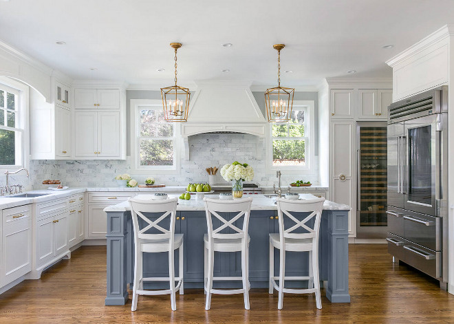 White Kitchen With Stacked Cabinets And Grey Island Home Bunch