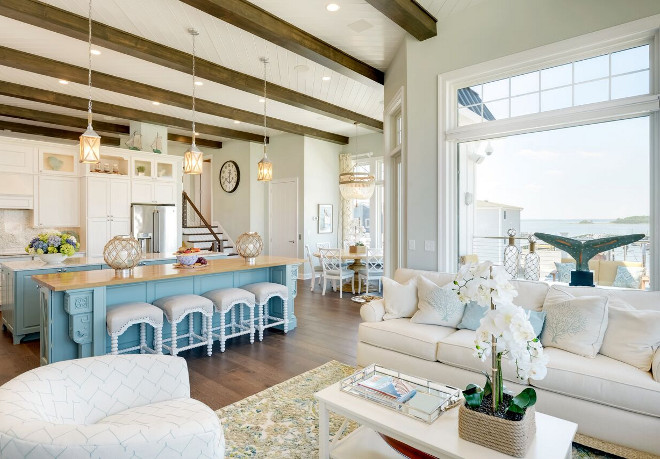 Beach House Interiors. Beach House Interiors. Located just off the kitchen, there is a cozy, yet formal lounge area. This level is packed with enhanced trim work, built-ins, and exposed beams, giving the home that luxurious beach feel. Beach House Interiors. Beach House Interiors #BeachHouseInteriors Echelon Interiors