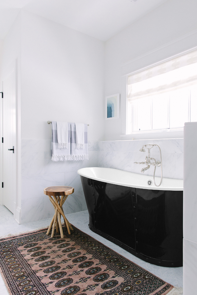 Black Rivet Tub. Black Rivet Freestanding Tub. Bransdale 'rivet' freestanding Cast Iron Roll Top 'Bateau' Bath. Bathroom features a black rivet tub and a kilim runner. Kate Marker Interiors