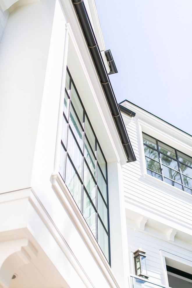 Black Steel Windows. White home with black steel windows and black gutters. Black Steel Windows. White home with black steel windows and black gutters. Black Steel Windows. White home with black steel windows and black gutters #BlackSteelWindows #Whitehome #blackwindows #blackgutters Patterson Custom Homes