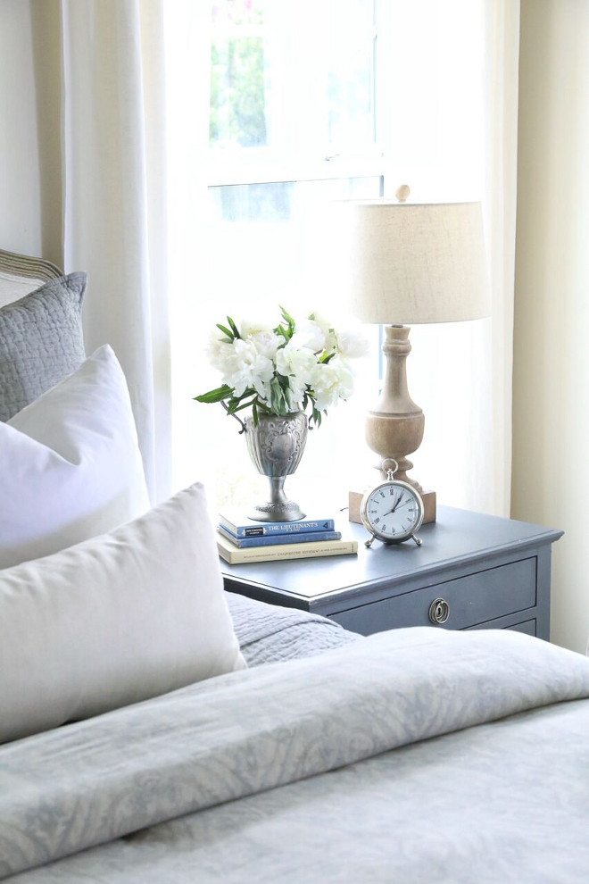 Choosing to customize our nightstands we painted them in Anne Sloane, Chalk Paint. Bringing a deep rich blue gray found in subtle hints throughout our home. Home Bunch's Beautiful Homes of Instagram @cambridgehomecompany