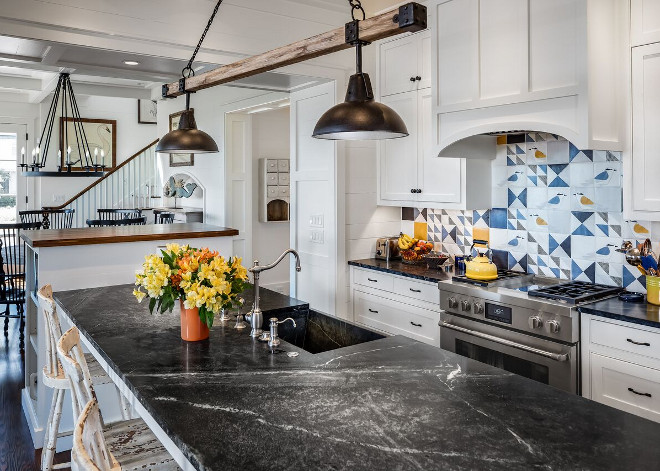 Coastal Farmhouse kitchen with honed soapstone countertop and rustic kitchen lighting. The walls and cabinets are Farrow & Ball Pointing White. Coastal Farmhouse kitchen with honed soapstone countertop and rustic kitchen lighting. Coastal Farmhouse kitchen with honed soapstone countertop and rustic kitchen lighting #CoastalFarmhousekitchen #honedsoapstone #countertop #rustickitchenlighting #rusticlighting