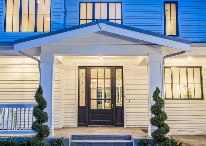 Front Door and Sidelights. Black Front Door and Sidelights. Front Door and Sidelight Ideas. A custom black front door with sidelights contrast against a crisp white siding. Front Door and Sidelight Design #FrontDoor #Sidelights Calista Interiors