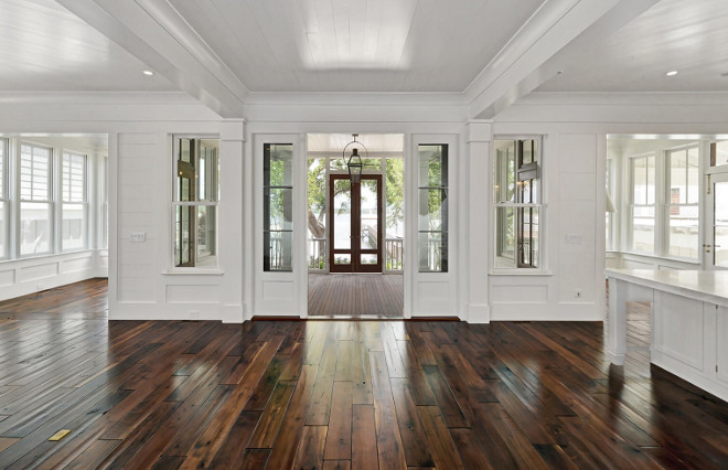 Kitchen and great room opens to screened patio Robyn Hogan Home Design