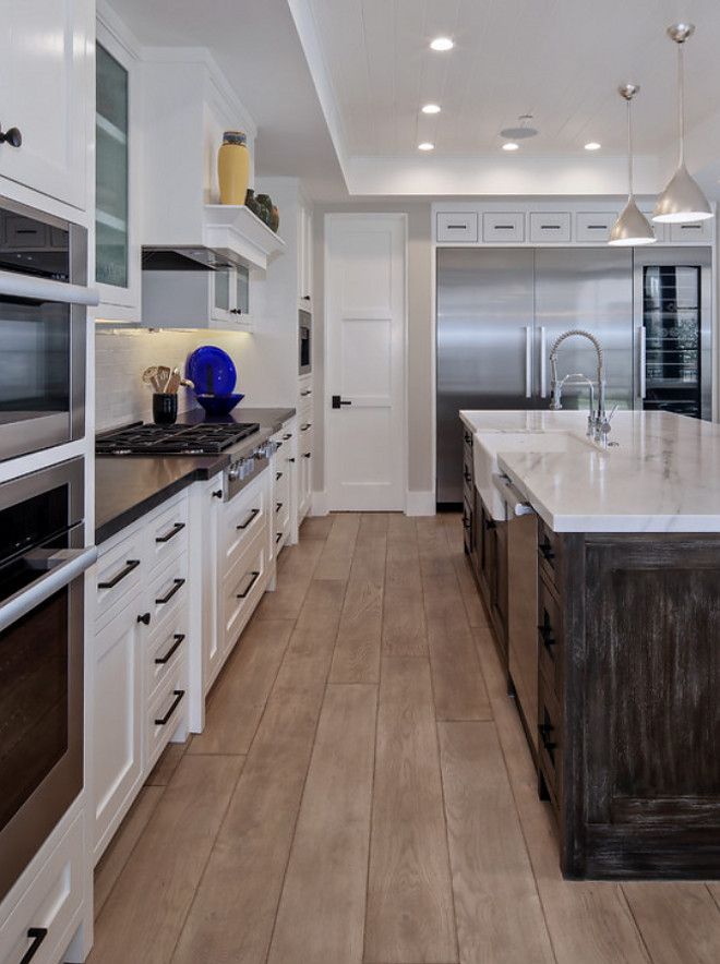 Light Rustic European white oak hardwood floor. Hardwood Floor- 7” light rustic European white oak, ¾” engineered floor, custom stain applied after installation, moisture barriers applied at first floor #LightRusticEuropeanwhiteoakhardwoodfloor #RusticEuropeanwhiteoakhardwoodfloor #Europeanwhiteoakhardwoodfloor Patterson Custom Homes