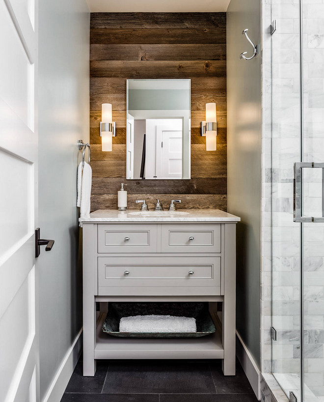 Rustic Bathroom with reclaimed shiplap. The shiplap wood is Kentucky tobacco barn wood. Bathroom with reclaimed shiplap. Bathroom rustic wood shiplap wall and open vanity from pottery Barn. Floor tile is Basalt Tile #bathroom #rusticbathroom #reclaimedshiplap #rusticshiplap #bathroom #wood #barnwood Norwell Design Build