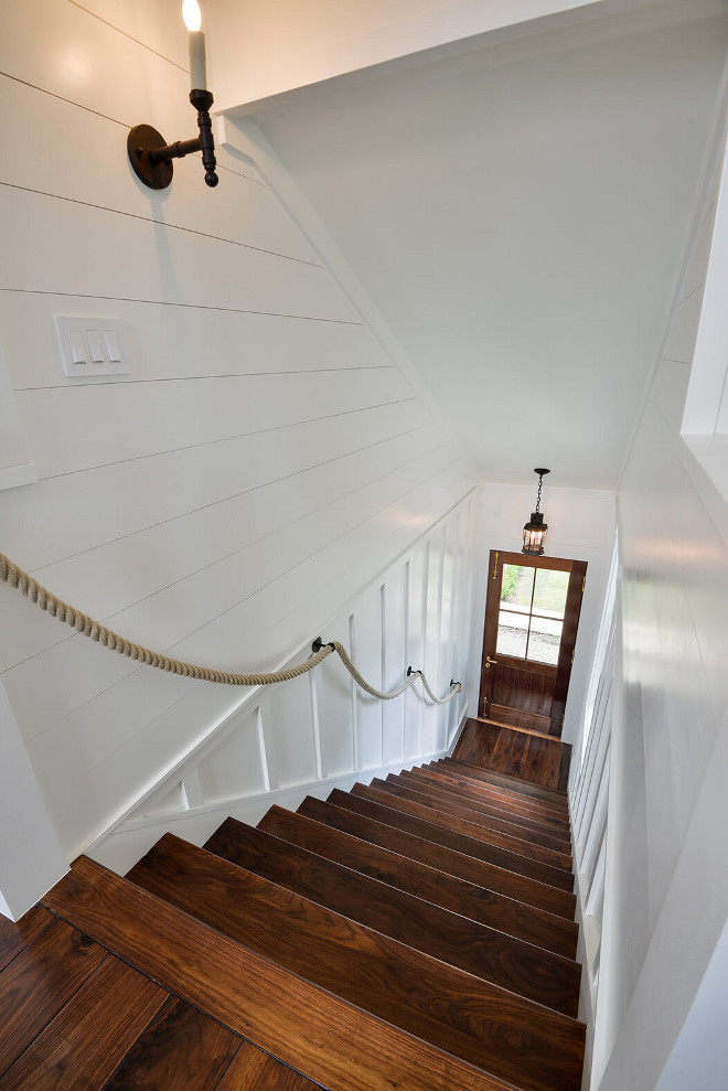 Staircase. Shiplap staircase. Staircase with shiplap and board batten trim, walnut wood treads and rope handrail #staircase #shiplap #boardandbattenstaircase #woodtreads #ropestaircase #ropehandrail Robyn Hogan Home Design