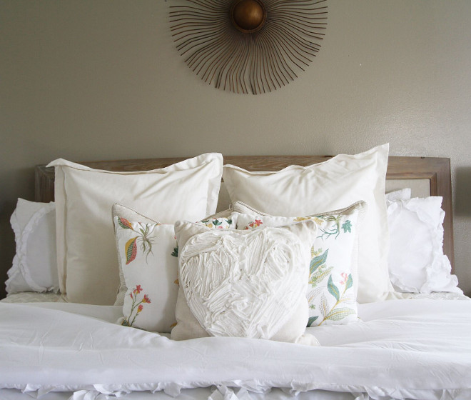 White bedding. I chose a white comforter in our master bedroom because I can easily incorporate color for any season and/or mood! Its easy to switch out a few pillows here and there to achieve the look I am going for that month or holiday. Right now it houses some beautiful embroidered pillow covers. Many have asked how and why I chose WHITE of all colors with toddlers. However it's not so bad and everything can be easily washed. All of our bedrooms are painted a soft grey. #Whitebedding #bedding Home Bunch's Beautiful Homes of Instagram @AshleysDecorSpace_ 