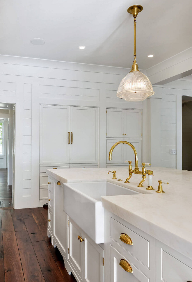 White kitchen paint color Sherwin Williams SW 7005 Pure White with Namibia Bright White marble countertop and unlacquered brass hardware and unlacquered brass faucet White kitchen paint color Sherwin Williams SW 7005 Pure White with Namibia Bright White marble countertop and unlacquered brass hardware and unlacquered brass faucet. White kitchen paint color Sherwin Williams SW 7005 Pure White with Namibia Bright White marble countertop and unlacquered brass hardware and unlacquered brass faucet. White kitchen paint color Sherwin Williams SW 7005 Pure White with Namibia Bright White marble countertop and unlacquered brass hardware and unlacquered brass faucet #Whitekitchen #Whitekitchenpaintcolor #SherwinWilliamsSW7005PureWhite #NamibiaBrightWhitemarble #whitemarble #countertop #unlacqueredbrasshardware #unlacqueredbrassfaucet Robyn Hogan Home Design