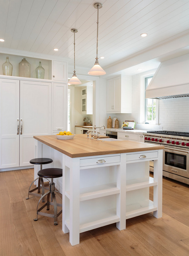 White kitchen with bleached white oak hardwood floor, white oak butcher's block countertop. The kitchen cabinet style is Framed with Inset Doors. White kitchen with bleached white oak hardwood floor, white oak butcher's block countertop. The kitchen cabinet style is Framed with Inset Doors. White White kitchen with bleached white oak hardwood floor, white oak butcher's block countertop. The kitchen cabinet style is Framed with Inset Doors #Whitekitchen #kitchen #bleachedwhiteoakhardwood #bleachedwhiteoakhardwoodfloor #bleachedwhiteoak #bleachedhardwood #whiteoak #whiteoakbutchersblock #butchersblock #butchersblockcountertop #kitchencabinetstyle #cabinetstyle #FramedInsetDoors #InsetDoors Haefele Design