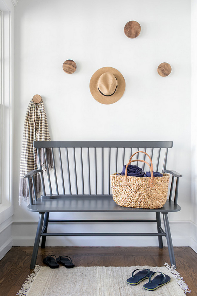 Casual Entry Bench Ideas. Casual Entry Bench. A grey bench and wooden hooks add a casual feel to this entry. Casual Entry Bench Ideas #CasualEntry #entry #Bench #entrybenchIdeas Chango & co