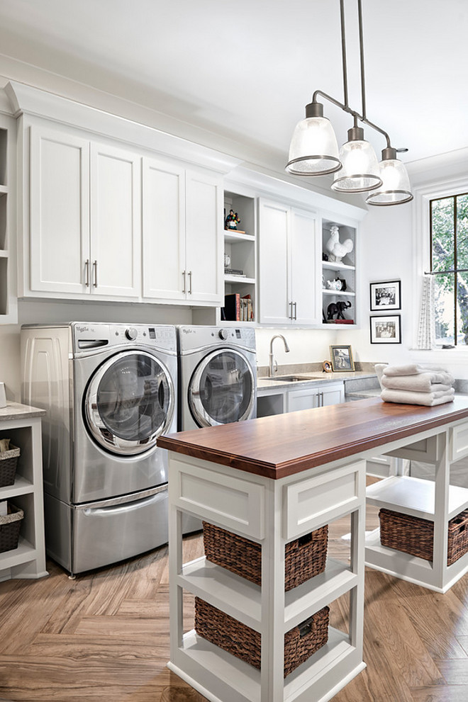 Farmhouse Laundry room. Farmhouse Laundry room. Farmhouse Laundry room. Folding table is a custom piece. Lighting is Feiss, Hobson Collection #FarmhouseLaundryroom Forte Building Group LLC