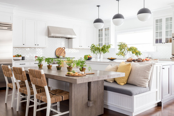 Kitchen island banquette. Farmhouse Kitchen island banquette. Sleek modern farmhouse white kitchen with large, custom island banquette. Farmhouse Kitchen island banquettedesign #FarmhouseKitchenisland #FarmhouseKitchenislandbanquette #islandbanquette Chango & Co.