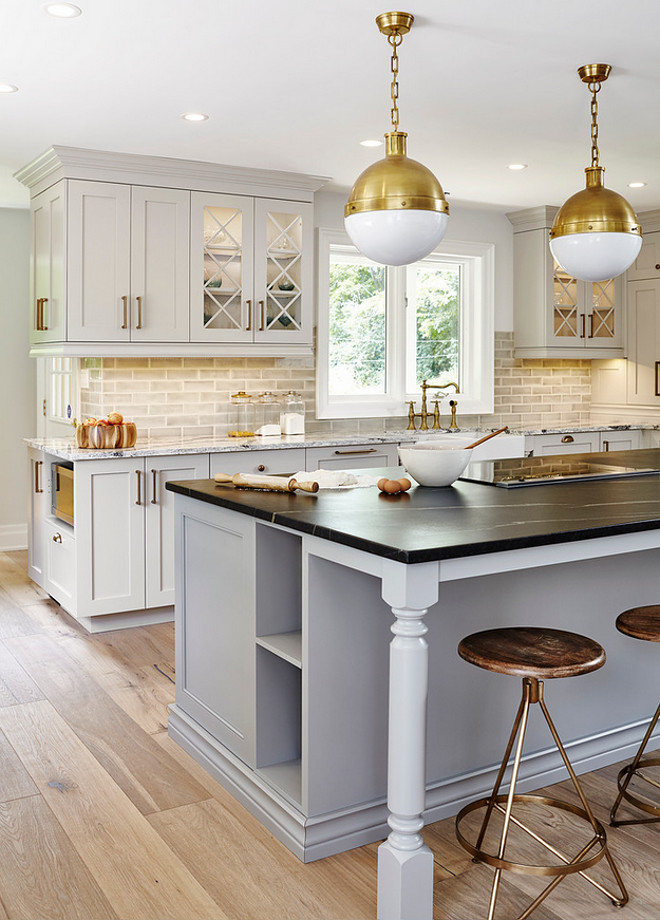 Shades of Gray Kitchen. Kitchen features pale gray perimeter cabinets and blue gray kitchen island. #kitchen #greykitchen #kitchen 