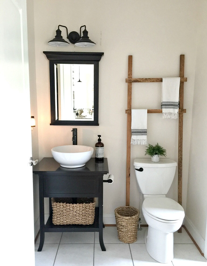 Small Farmhouse Bathroom. Small Farmhouse Bathroom with towel ladder. Small Farmhouse Bathroom #SmallFarmhouseBathroom Beautiful Homes of Instagram @middlesisterdesign - Home Bunch