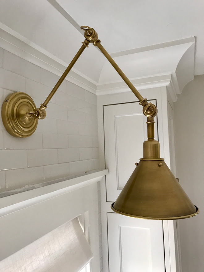 Brass Kitchen Sconce. Brass Kitchen Sconce. Sconces above the windows are Ralph Lauren Anette Library Light by Visual Comfort in Natural Brass. #BrassKitchenSconce Ralph Lauren Anette Library Light by Visual Comfort in Natural Brass. #RalphLauren #AnetteLibraryLight #lighting #VisualComfort #NaturalBrass Home Bunch Interior Design