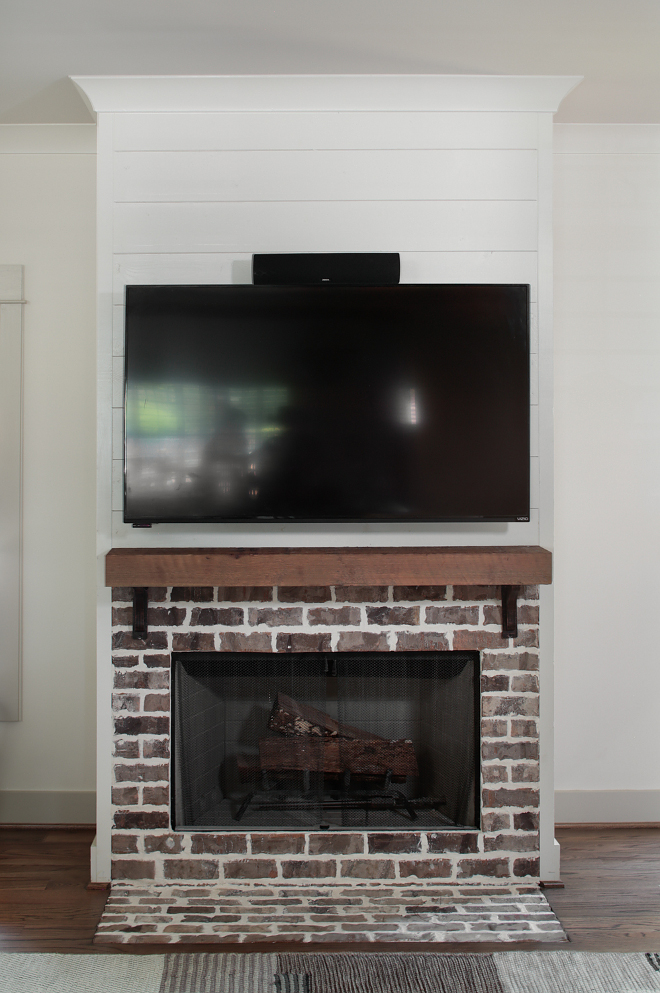 Brick fireplace timber mantel and shiplap. This farmhouse-style fireplace features exposed brick and custom Cedar mantel and shiplap. Brick fireplace timber mantel and shiplap. Brick fireplace timber mantel and shiplap. Brick fireplace timber mantel and shiplap. Brick fireplace timber mantel and shiplap #Brickfireplace #timber #mantel #shiplap Willow Homes