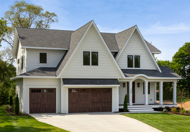 Cream White exterior. Cream white exterior with wood door ideas. Cream White exterior color ideas #CreamWhiteexterior #exterior #exteriorideas #creamwhite #woodfrontdoor Bria Hammel Interiors