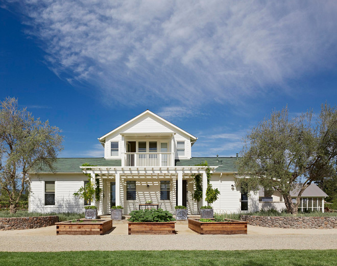 Cream white farmhouse exterior paint color Siding Paint Color Navajo White OC-95. Home Bunch's Best White Benjamin Moore Paint Colors. Jennifer Robin Interiors.