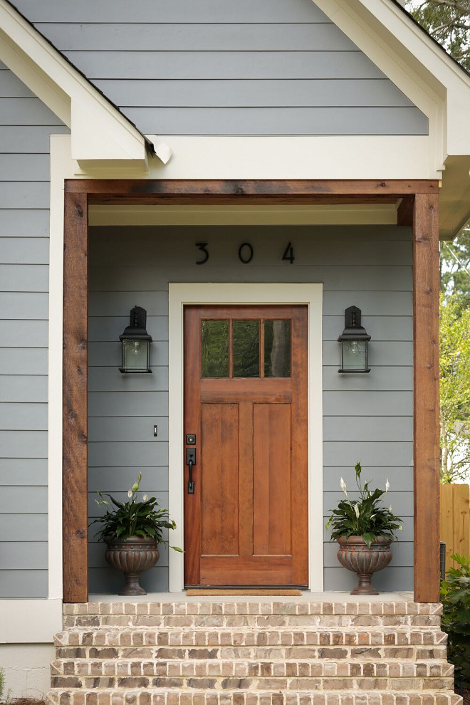 Exterior Ideas. Exterior siding is Hardie Siding in Benjamin Moore Whale Gray. Trim Paint Color is Pratt & Lambert Gray Moire. Brick Steps Old St. Louis Brick. #exterior #exteriorideas #bricksteps #hardieplank #hardie #siding #benjaminmoorewhalegray #trim #paintcolor #brick #exteriors Willow Homes