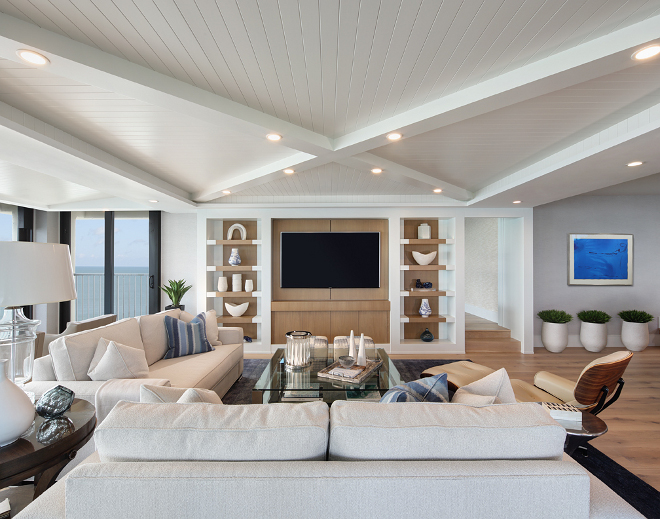 Family room tv built in shelves. The custom built-in is a combination of bleached walnut and paint grade for a perfect contrast. #tvbuiltins #builtins #familyroom W Design