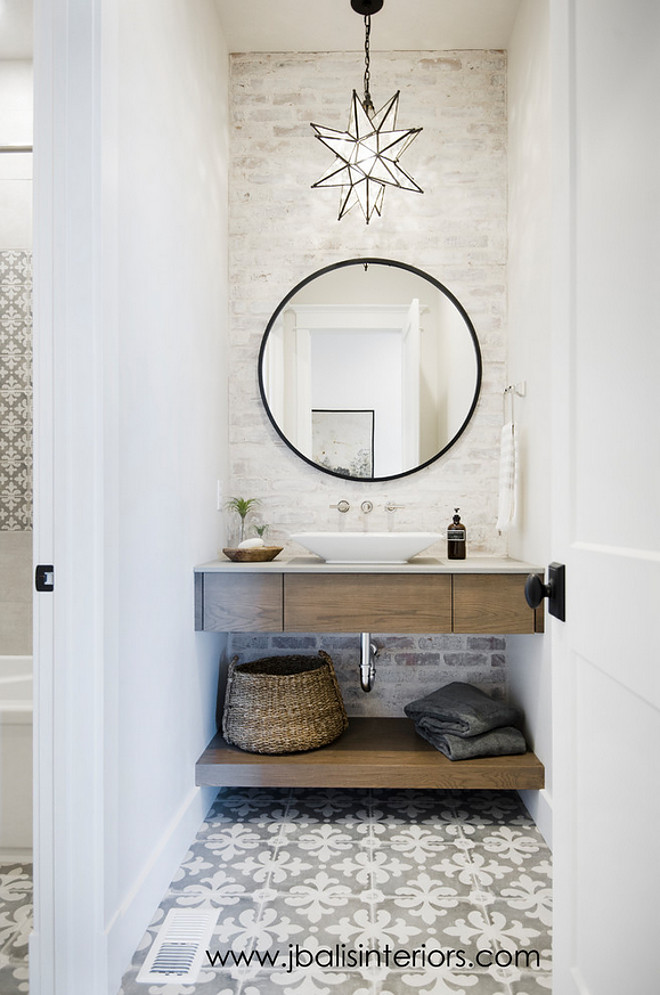 Farmhouse Bathroom with freestanding vanity, cement tile and painted brick wall. Farmhouse bathroom #farmhousebathroom #farmhouse #bathroom Judith Balis Interiors