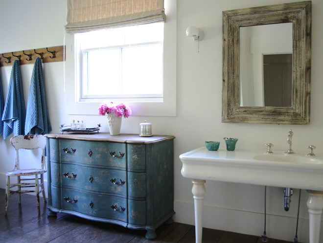 Farmhouse Bathroom. Farmhouse Bathroom. We love the vintage sink and oversized bathtub and only added the chest of drawers under the sink for storage. Farmhouse Bathroom. Farmhouse Bathroom #FarmhouseBathroom Beautiful Homes of Instagram @SanctuaryHomeDecor