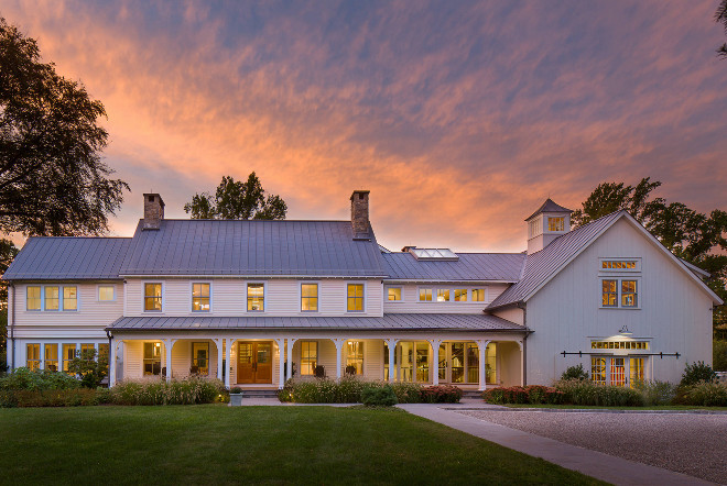 Farmhouse Exterior. Large farmhouse exterior. Farmhouse Exterior. Large farmhouse exterior with white siding, barn doors, metal roof #whitesiding #barndoors #metalroof #Farmhouse #Exterior #farmhouseexterior HOBBS INC