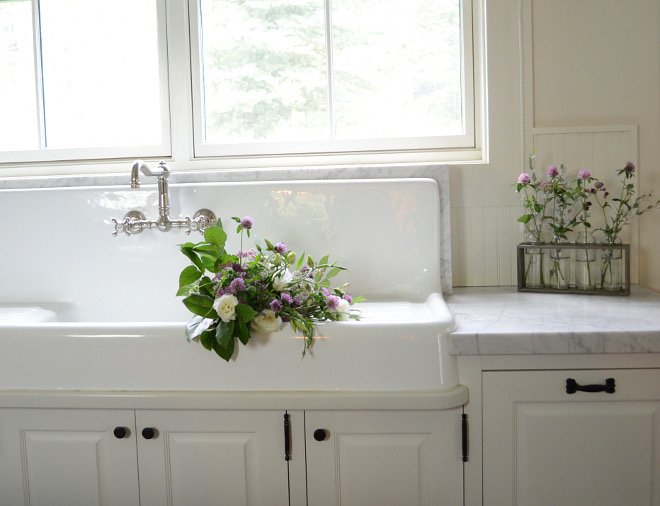 Farmhouse Sink. This sixty-inch reproduction farmhouse sink, was the centerpiece of our kitchen design. I fell in love with the retro look and decided to design the rest of the kitchen around the sink. The windows above look out across the creek, so this in my favorite place to be in the kitchen! #farmhousesink #farmhouse #sink Beautiful Homes of Instagram @SanctuaryHomeDecor